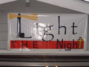 Light the Night Sign on House