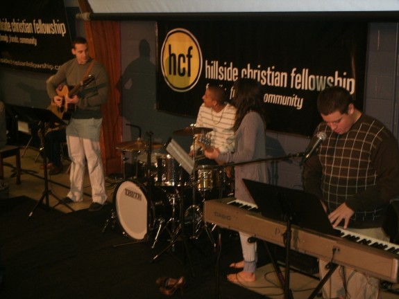 HCF Worship Team members practicing before morning service